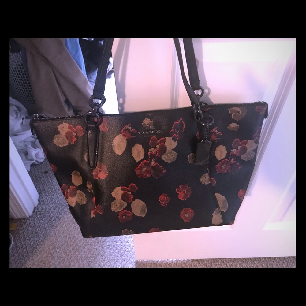 Coach “poppy” tote with matching cosmetic bag.